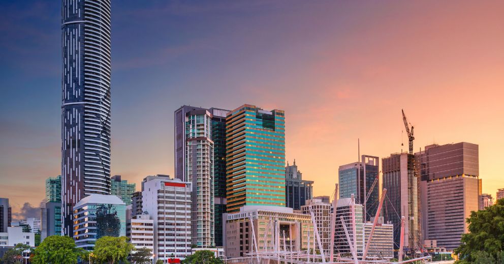 Brisbane city skyline at sunset, reflecting on finding the right domestic violence lawyer.